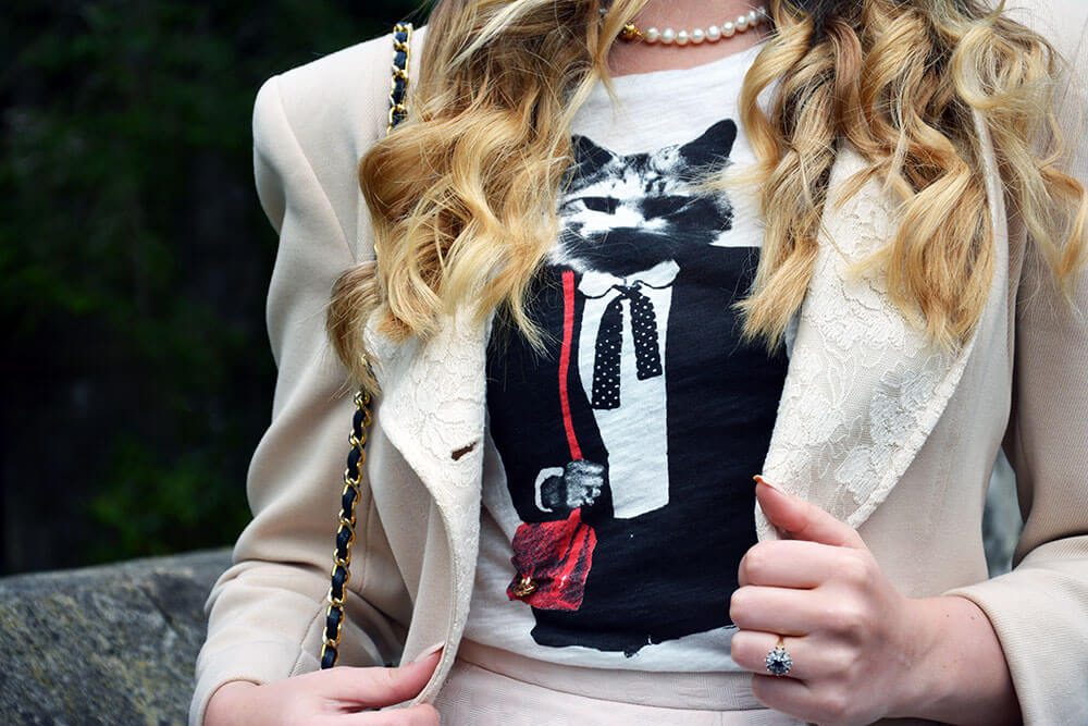 Edita in Christian Dior jacket, Chanel bag, H&M skirt, MAJE top, Marina Rozen jewellery 4