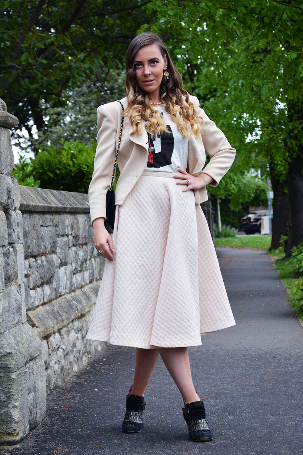 Edita in Christian Dior jacket, Chanel bag, H&M skirt, MAJE top, Marina Rozen jewellery 7