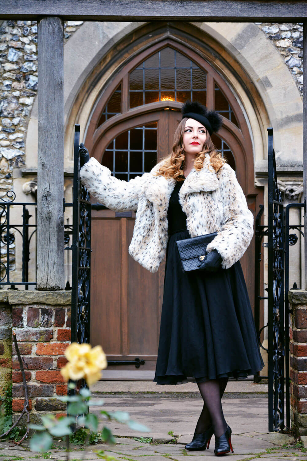 Edita wears Vintage Coat, Frank Usher skirt, Loboutin boots, Chanel bag, Tia Tights and Henry Holland hat 3