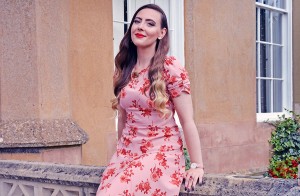 Fashion influencer wearing summer outfit and brooch