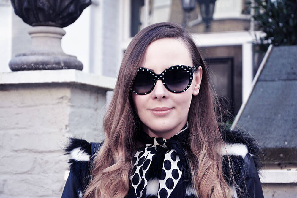 Edita in Biba coat, HM jeans, Cesare Paciotti, Moschino backpack, D&G glasses 7