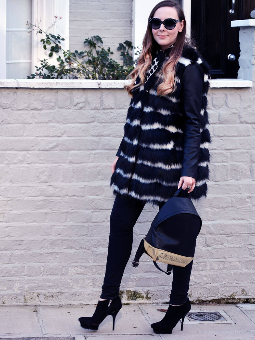 Edita in Biba coat, HM jeans, Cesare Paciotti, Moschino backpack, D&G glasses 8