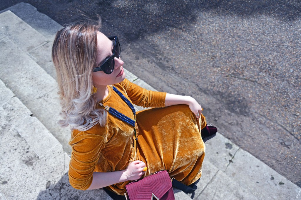 edita in mustard yellow dress