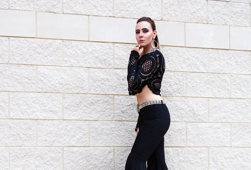 tough chic outfit with chandelier earrings