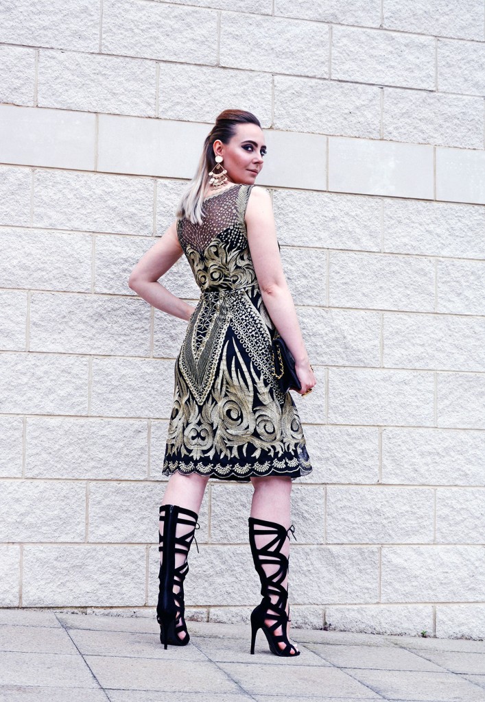 Edita in evening outfit gold embroidery