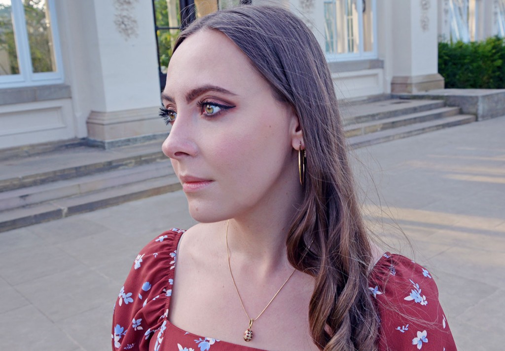 Jewellery blogger in Faberge egg pendant in Kew Gardens